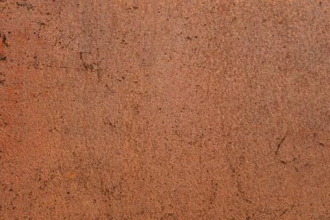 Abstract rusty metal surface with rough texture and brown orange tones crea.. Фото