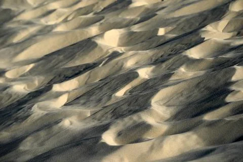 Abstract Sand Dune Patterns with Light and Shadow Texture Stock Photos