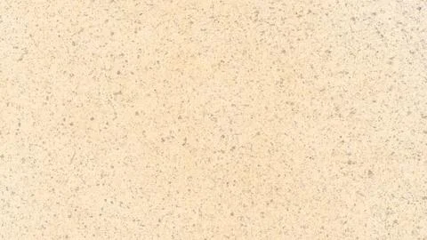 Abstract sandy beige texture background with speckled light brown and white.. Stock Photos