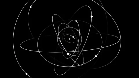 Abstract scientific illustration of subatomic particles orbiting. Stock Footage 327111987