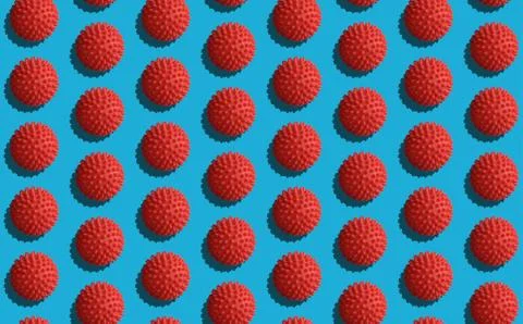 Abstract seamless pattern COVID-19. Red balls with spikes on a blue. Foto stock
