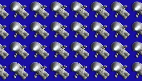 Abstract seamless spaceman pattern. Astronaut on a blue background. Stock Photos