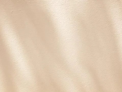 Abstract shadow and light on beige wall, abstract background Stock Photos