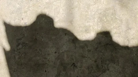 Abstract shadow overlay on textured concrete wall surface. Stock Footage 341956833
