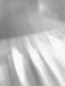 Abstract shadow patterns on textured wall background Foto stock