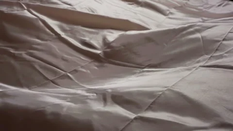Abstract Shadow Play on White Satin Stock Footage 264150556