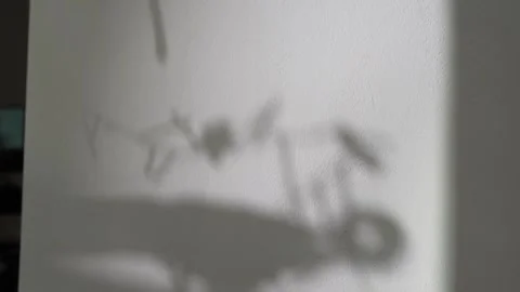 Abstract shadow on wall silhouette garland with toys Stock Footage 260548723