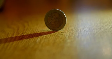 Abstract shadows moving around a coin Stock Footage 90942194