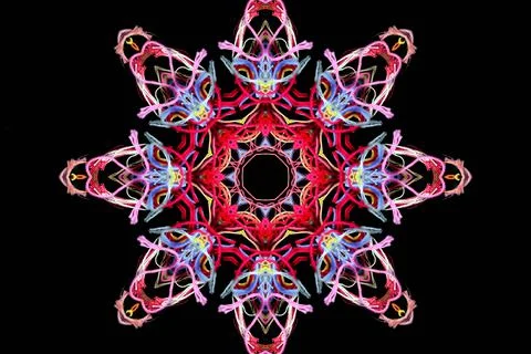 Abstract shape from multicolored threads on a black background Stock Illustration