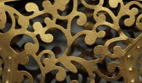 Abstract shaped texture made of brass. Brass ornament Stock Photos