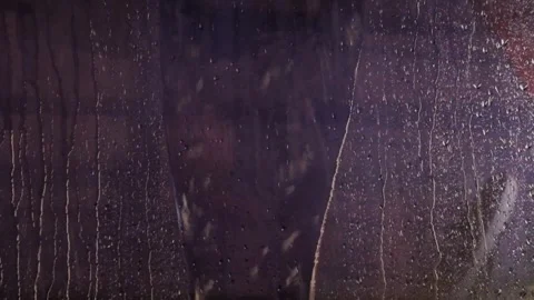Abstract shapes, patterns and textures of raindrops and droplets on black gl Stock Footage 291557005