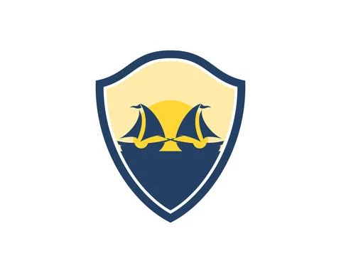 Abstract shield with two sailboat and sunset behind Stock Illustration