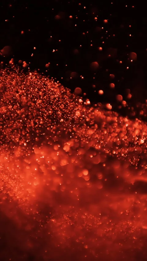 Abstract shining red particles in dynamic motion over dark background. Vertical Stock Footage 269189047