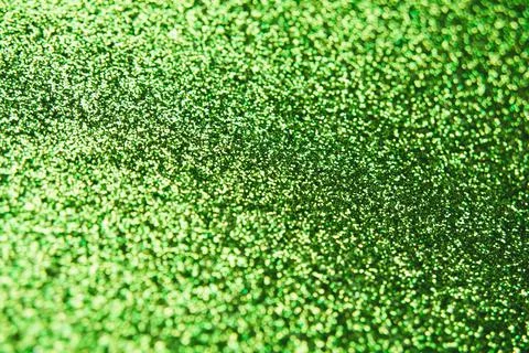 Abstract shiny blurred green background. Textured glittering backdrop Stock Photos