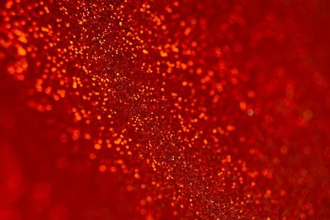 Abstract shiny blurred red background. Textured glittering backdrop Stock Photos