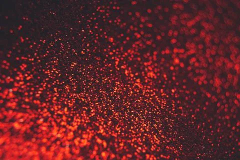 Abstract shiny blurred red background. Textured glittering backdrop Stock Photos