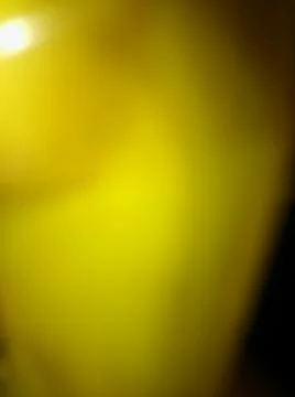 Abstract shiny yellow background with different elements and black parts in s Foto stock