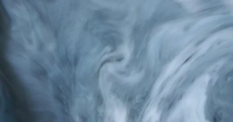 Abstract shot of light blue ink forming shapes Video stock 137420582