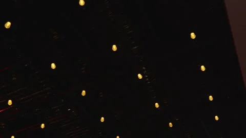 Abstract shot of lightbulbs swinging from the ceiling Stock Footage 150125765