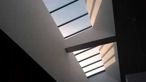 Abstract shot looking up at sky light window in modern building 3 Vídeos de archivo 143230464