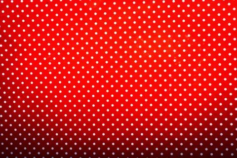 Abstract shot of a red background  with white dots Stock Photos