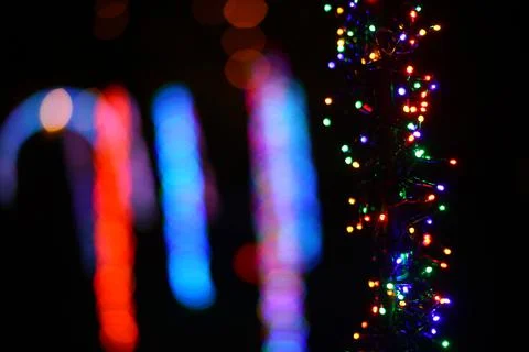 Abstract shot of string lights becoming blurry color spots Stock Photos