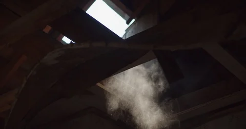 Abstract shot of sun beam through dust in abandoned ghost town house Stock Footage 111398569