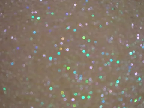 Abstract shot of tiny multicolored bokeh lights background for wallpapers Foto stock