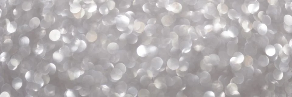 An abstract silver background with sparkle lights and bokeh. Useful as Christ Stock Photos