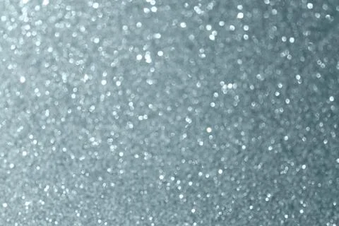Abstract silver glitter or blur light effect background. Glittering silver gr Stock Illustration