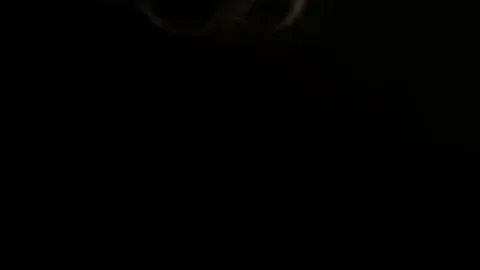 Abstract Skeletal Light Patterns on a Black Surface Stock Footage 121584388