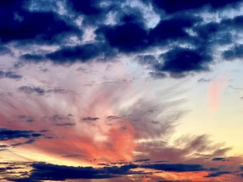 Abstract sky background with a multicolored sunset Stock Photos