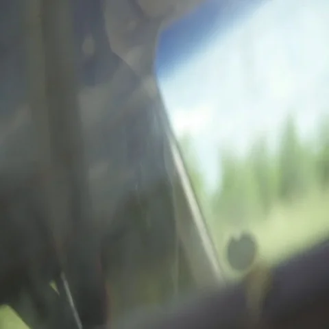 Abstract slow motion driving shot through back window of pickup truck, Video stock 69459851