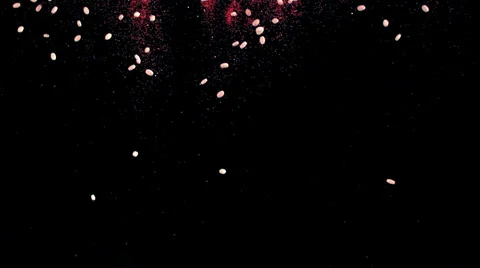 Abstract slow motion falling particles and red paint Stock Footage 64901650