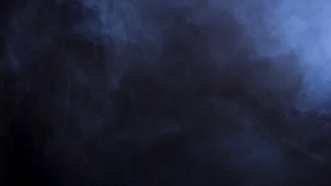Abstract smoke clouds over a black background Stock Footage 96415519
