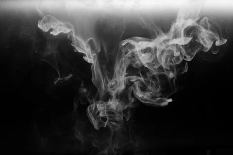 Abstract smoke on a dark background, isolated . Stock Photos
