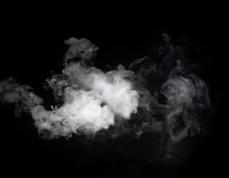 Abstract smoke on a dark background . Stock Photos