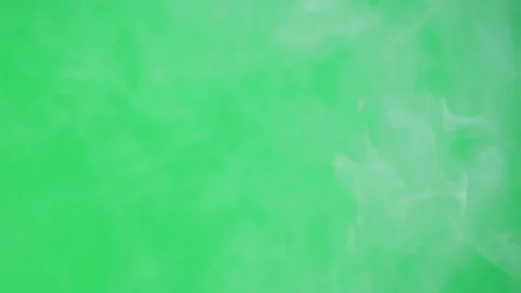 Abstract smoke on green chroma key background. Smoking, steam clouds close-up. Stock-Footage 182014226