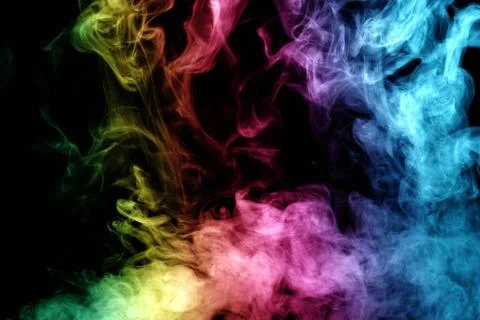 Abstract smoke isolated on black background,Rainbow powder Stock Photos