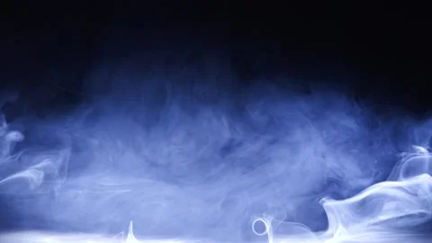 Abstract smoke moves on black background. Swirling smoke. Stock Footage 255675250