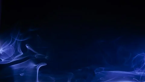 Abstract smoke moves on black background. Swirling smoke. Stock Footage 255676152