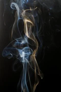 Abstract smoke patterns on dark background 스톡 사진