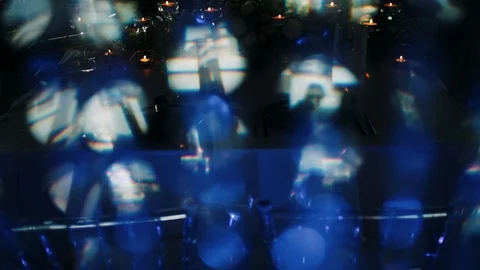 Abstract smooth blue bokeh lights on dark blurred background. Bright bokeh effec Stock Footage 122903157