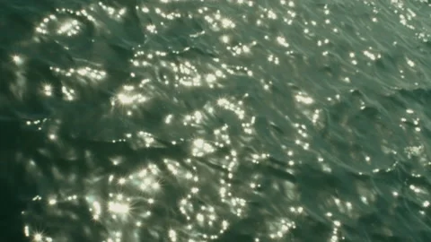 Abstract smooth glittering, shiny water with sun reflections. Stock Footage 156900624