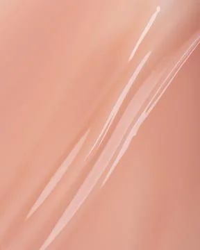Abstract soft beige fluid texture with flowing lines and glossy finish. Minim Stock Photos