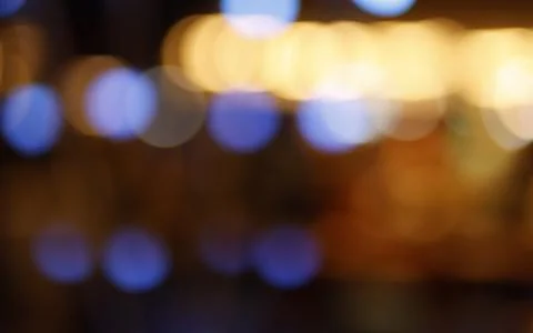 Abstract soft defocused bokeh lights with colorful glowing circles and warm.. Stock Photos