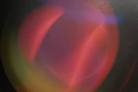 Abstract soft-focus image with glowing, overlapping red, pink, and purple e.. Stock Illustration