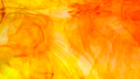 Abstract Soft focus orange color ink floating in water for backdrop use. Vidéo 194411466