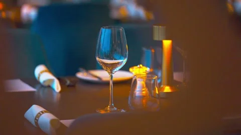 Abstract Soft-Focus Panning Shot Across Elegant Restaurant Table Setting 動画素材 346654096