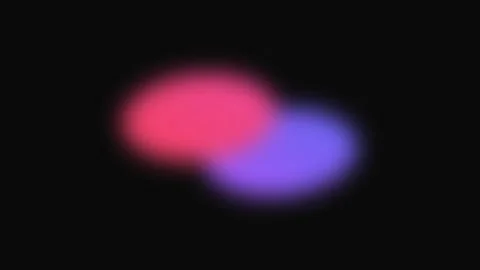 Abstract soft glowing blue and pink oval shapes on a deep black background Stock Footage 339617178